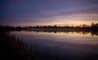 alba sui laghi del nord manitoba foto