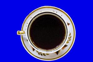 tazza di caffè bianca su legno vintage. vista dall'alto foto