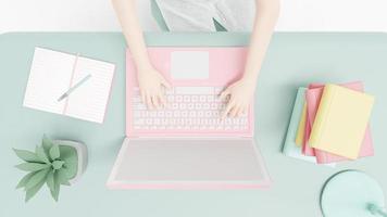 mani che premono sulla tastiera rosa del laptop sulla scrivania verde con pianta, notebook e lampada sul tavolo, vista dall'alto. progettato in toni pastello, rendering 3d. foto