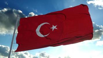 bandiera della Turchia che soffia nel vento con uno sfondo di cielo blu. rendering 3D foto