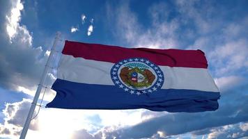 bandiera del Missouri su un pennone che sventola nel vento, sfondo blu del cielo. rendering 3D foto