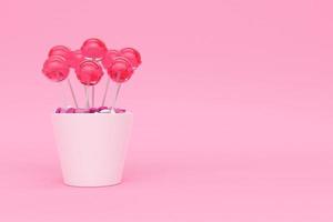 Set di rendering 3d di lolipop rosa in vaso di ceramica bianca su sfondo rosa foto