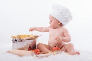 baby chef su sfondo bianco foto