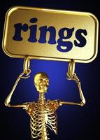 anelli di parola e scheletro d'oro foto