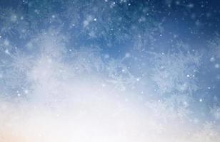 modello blu ghiacciato invernale con fiocchi di neve, sfondo stagionale delle vacanze. Buon Anno foto