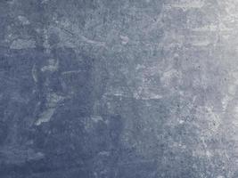 bella priorità bassa della parete dello stucco della luce blu navy decorativo astratto di lerciume. banner di texture stilizzata ruvida con spazio per testo. immagine di sfondo di una parete intonacata con un bel colore. foto