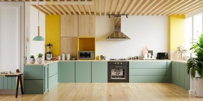 interni moderni della cucina con mobili. interni eleganti della cucina con la parete gialla. foto