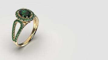 anello ovale con smeraldo in oro giallo foto