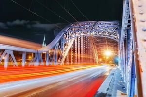 ponte vistola lungofiume soleggiata giornata invernale neve, cracovia, po foto