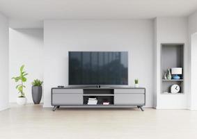 design tv su armadio interno camera moderna con piante, mensola, lampada sul muro bianco. foto