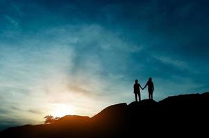 silhouette di leadership di squadra, lavoro di squadra e lavoro di squadra e deliziosi concetti di silhouette foto