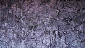 fondo astratto di lerciume del mortaio con la parete scura della vernice. foto