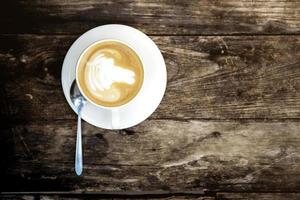 tazza di caffè su legno vecchio. foto