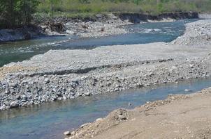 sfondo della superficie dell'acqua blu foto