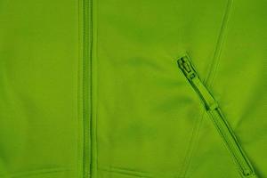 zip la parte anteriore del maglione verde. foto