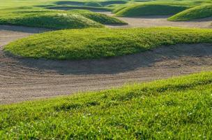 sfondo del bunker di sabbia del campo da golf per il torneo estivo foto