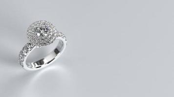 anello di fidanzamento con fede nuziale 3d render in oro bianco foto