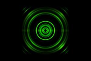 anello verde astratto con onde sonore oscillanti sullo sfondo foto