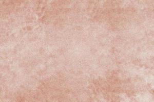superficie lavabile in marmo rosa antico o sabbia, pietra di dettaglio, sfondo astratto foto