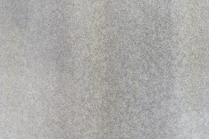 texture di vecchio lavaggio grigio sabbia ruvida, pietra di dettaglio, sfondo astratto foto