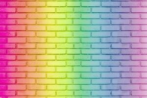 arcobaleno colorato di sfondo muro grunge. idea della struttura del muro di mattoni grungy dell'annata dipinta colorata vecchia. foto