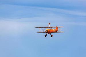 Shoreham via mare, West Sussex, Regno Unito, 2011. Breitling wingwalker - boeing stearman foto