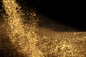 polvere di particelle d'oro per lo sfondo foto