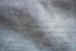 trama di blue jeans tessili da vicino foto