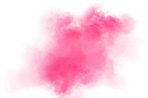 schizzi di polvere rosa su sfondo. esplosione di polvere rosa su sfondo bianco. foto