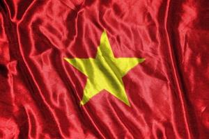 bandiera di stoffa del vietnam d'america bandiera di raso sventolando la trama del tessuto della bandiera foto