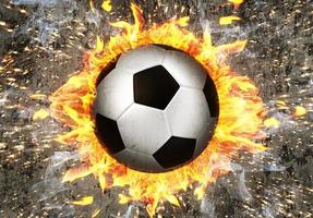 pallone da calcio in fiamme foto