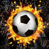 pallone da calcio in fiamme foto