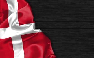 Primo piano della rappresentazione 3d della bandiera della Danimarca foto