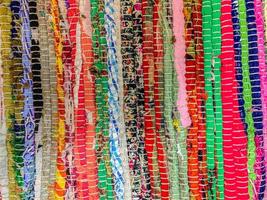 sfondo colorato tappeto tessile. trama del tappeto foto