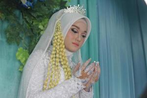 bella sposa musulmana indonesiana. foto