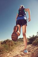 donna di trail running foto
