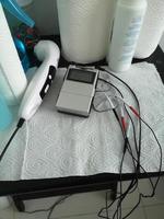 terapia di elettrostimolazione e ultrasuonoterapia sul lettino, elettroagopuntura a doppio canale, attuatore elettrico foto
