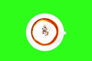 primo piano caffè cappuccino su sfondo verde. foto