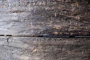 vista ravvicinata su diverse superfici in legno di tronchi di assi e pareti in legno ad alta risoluzione foto