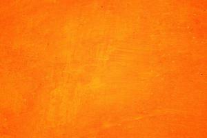 trama di sfondo astratto arancione. vuoto per il design, bordi arancioni scuri foto