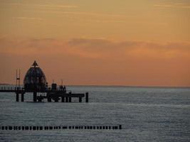 tramonto sulla spiaggia di Ofzingst foto