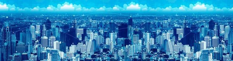 città visiva blu con linea di rete digitale per la tecnologia di connessione dati foto