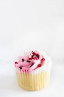 cupcake singolo San Valentino con cuore spruzza foto