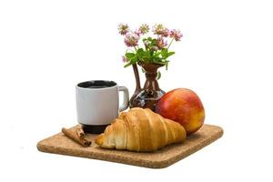 colazione con caffè e croissant foto