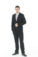 uomo d'affari bello e intelligente in abito nero isolato su sfondo bianco. copia spazio foto