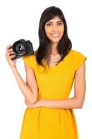 fotografo femminile in possesso di una macchina fotografica foto