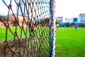 rete da calcio con sfondo sfocato foto