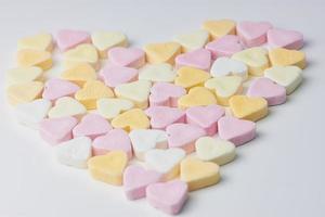 cuori di caramelle in colore pastello, a forma di cuore foto