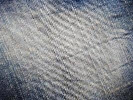 fondo di struttura del tessuto dei jeans foto