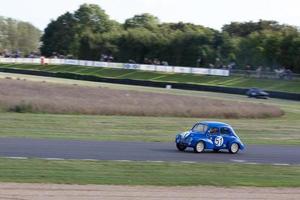 corse d'epoca a Goodwood il 14 settembre 2012. una persona non identificata foto